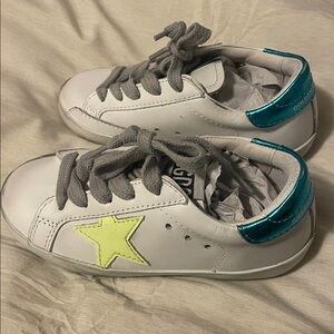 Baby Golden Goose Sneakers.
Never worn, but box not included. US 4/5.